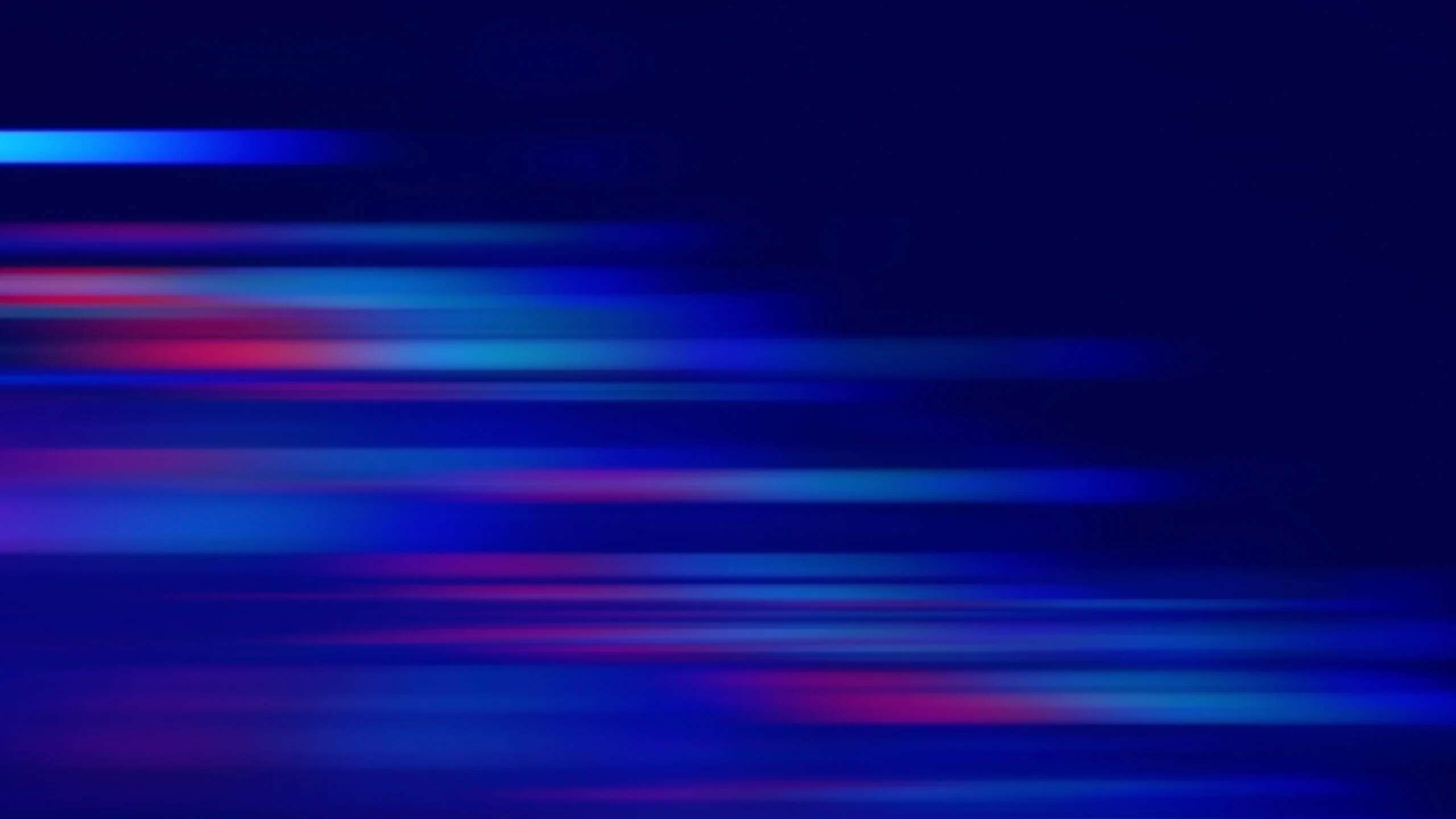 Abstract futuristic motion blur background with blue and red neon light streaks